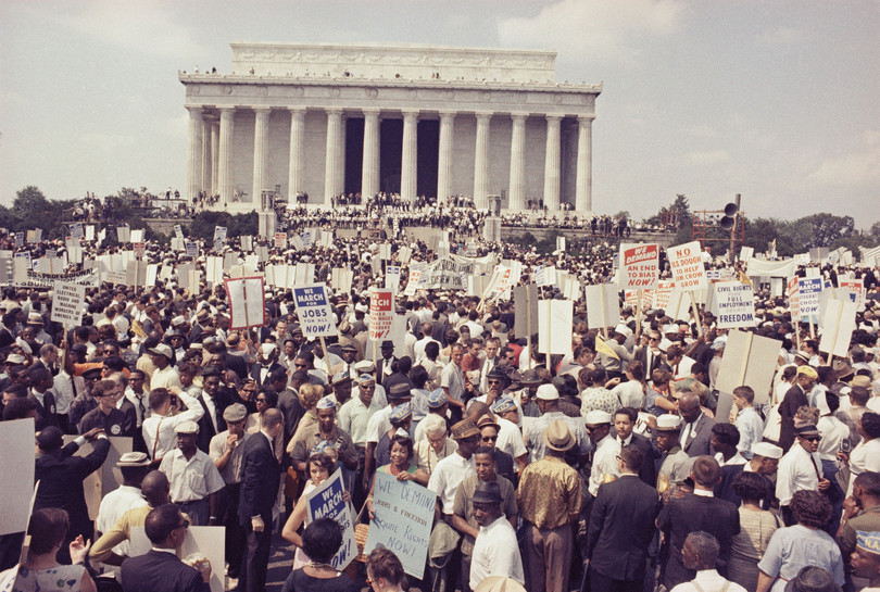 Large crowds gather at the Lincoln Memorial to demonstrate for civil rights in Washington, D.C. (1963)